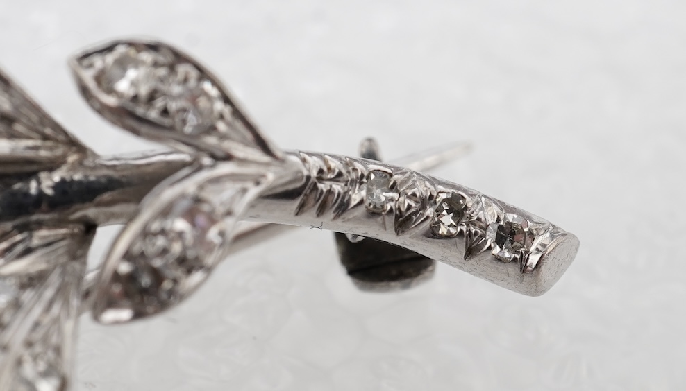 A ruby and diamond floral spray brooch